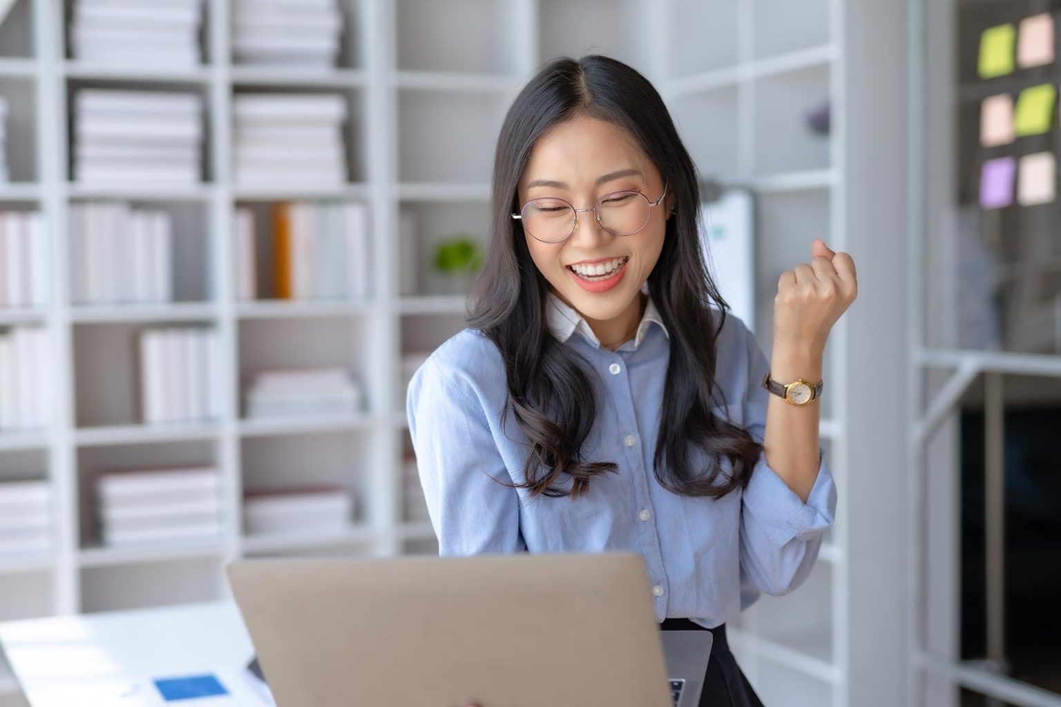 Happy woman with laptop